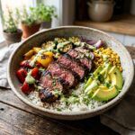 Smoky Steak Rice Bowl with Roasted Vegetables and Creamy Lime Sauce